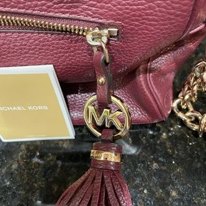 Beautiful Michael Kors Burgundy and Gold Satchel handbag with Shoulder Strap.